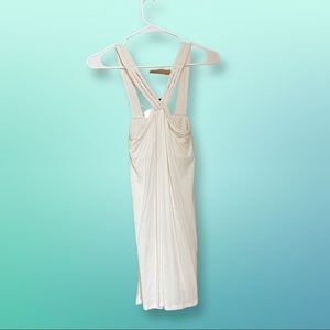 Woman’s White sleeveless top.